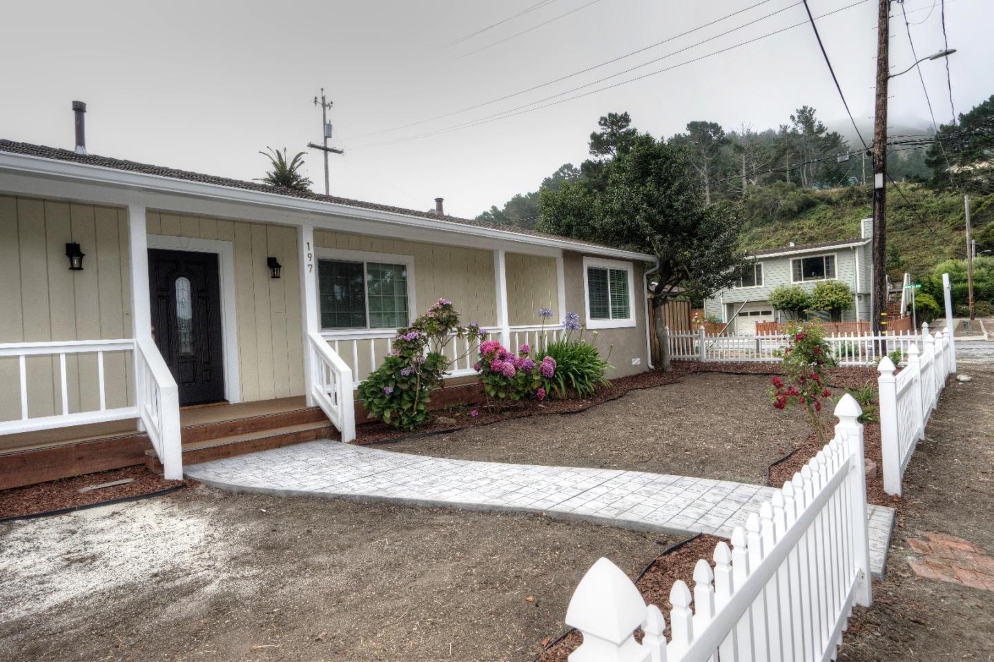 197 Ramona Avenue Pacifica, CA 94044 - Photo 20 of 26 a view of a house with backyard and porch