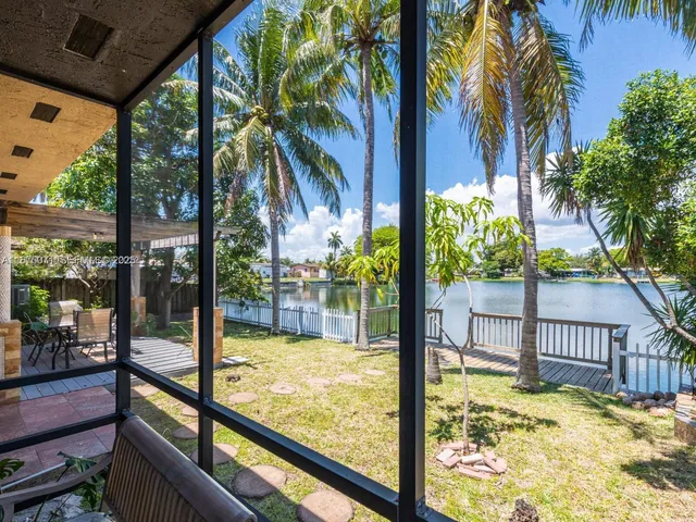 a view of swimming pool from a balcony