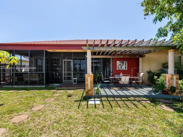a view of swimming pool with chairs