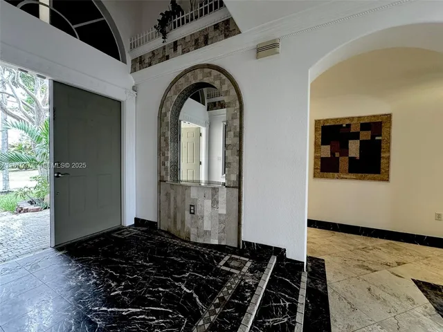 a black and white photo of a living room