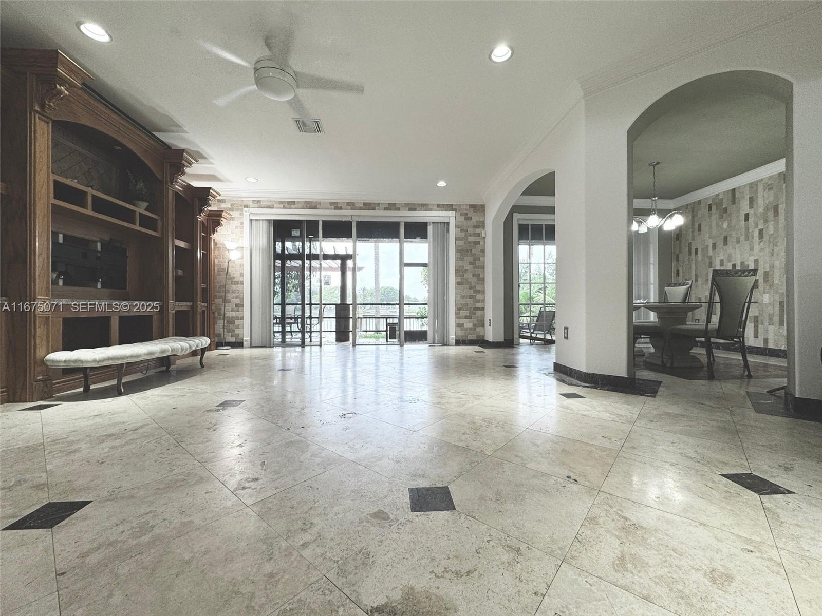 232 Southwest 7th Avenue Hallandale Beach, FL 33009 - Photo 30 of 48 an empty room with entrance and windows