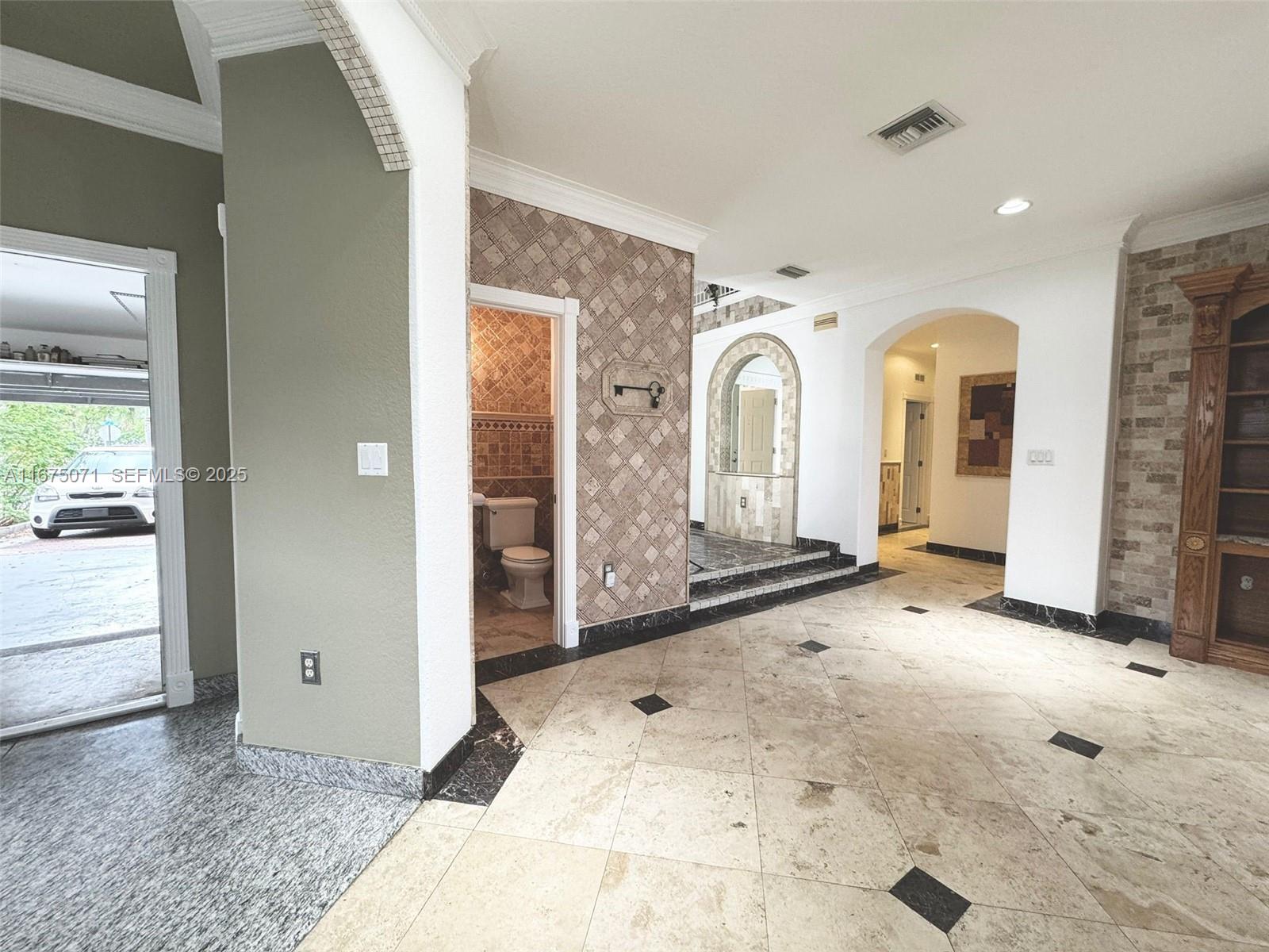 232 Southwest 7th Avenue Hallandale Beach, FL 33009 - Photo 34 of 48 a view of a big room with closet and mirror