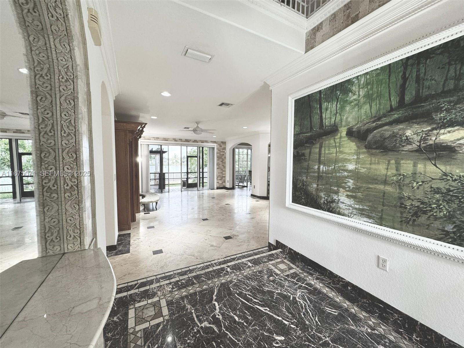 232 Southwest 7th Avenue Hallandale Beach, FL 33009 - Photo 35 of 48 a view of a living room and a balcony