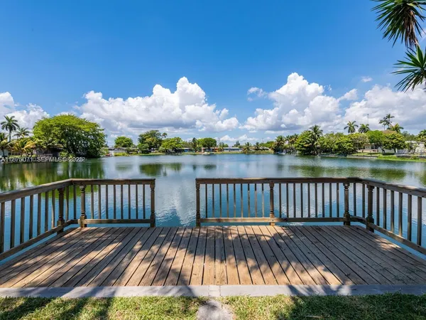 a view of a wooden roof with lake view