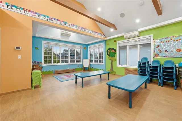 a living room with furniture and a table