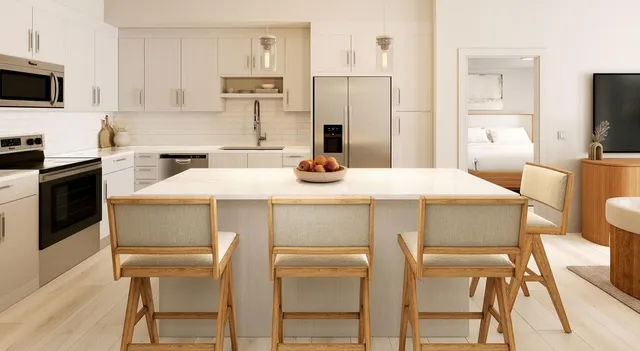 a kitchen with a table chairs refrigerator and microwave