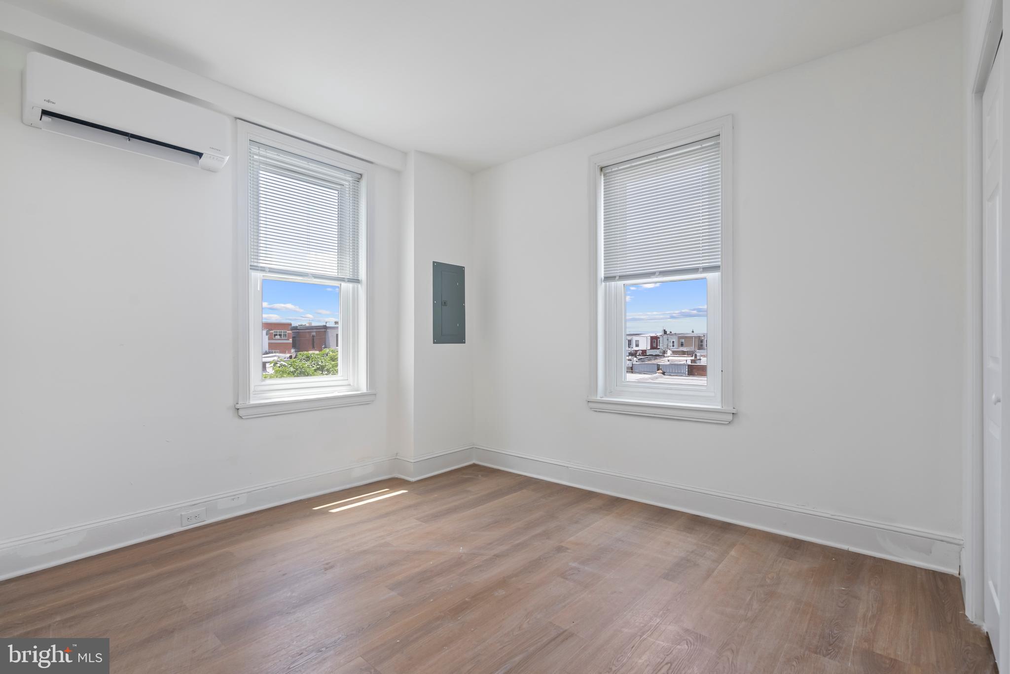 1618 South Broad Street Philadelphia, PA 19145 - Photo 24 of 27 an empty room with windows and closet