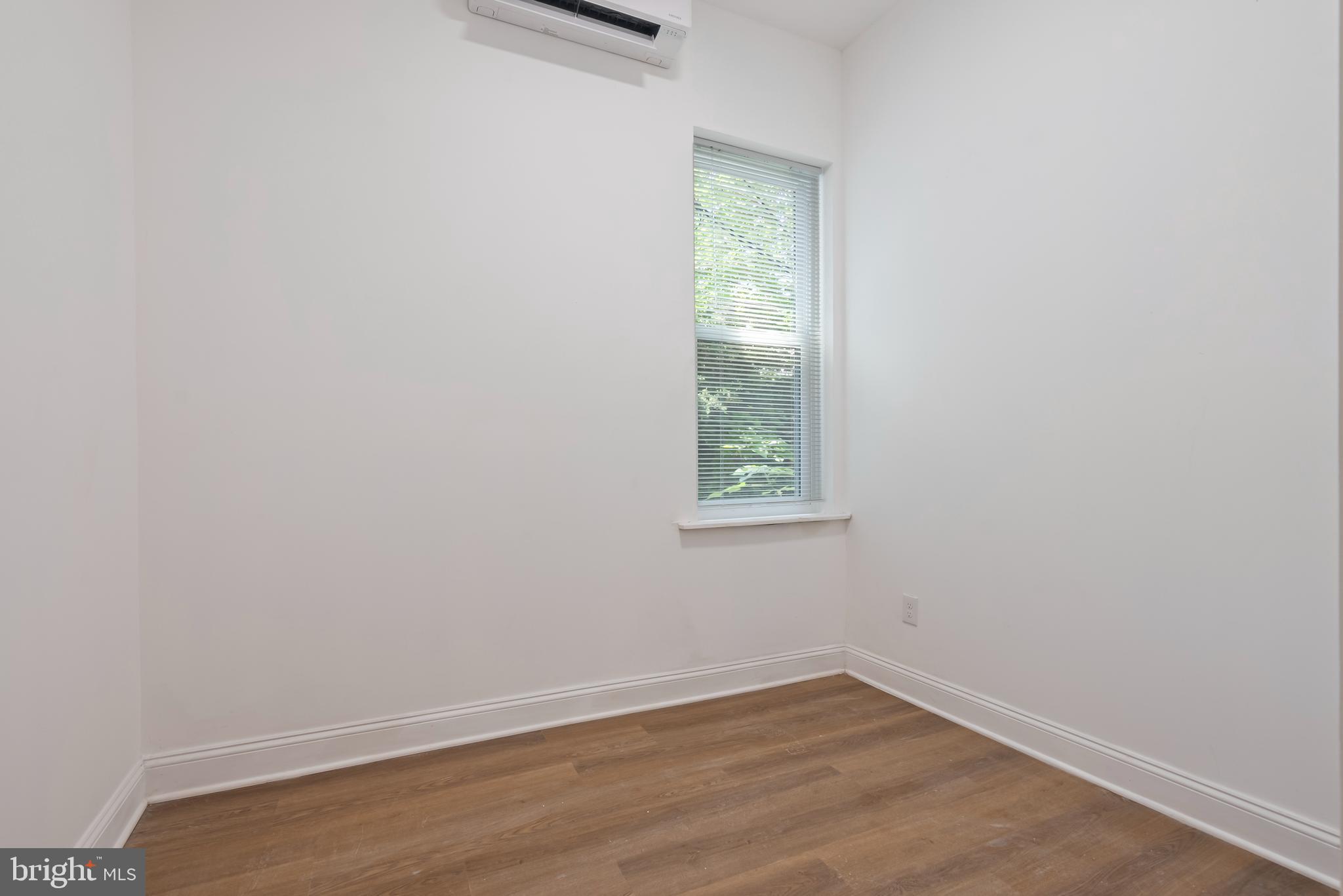1618 South Broad Street Philadelphia, PA 19145 - Photo 8 of 27 an empty room with a window