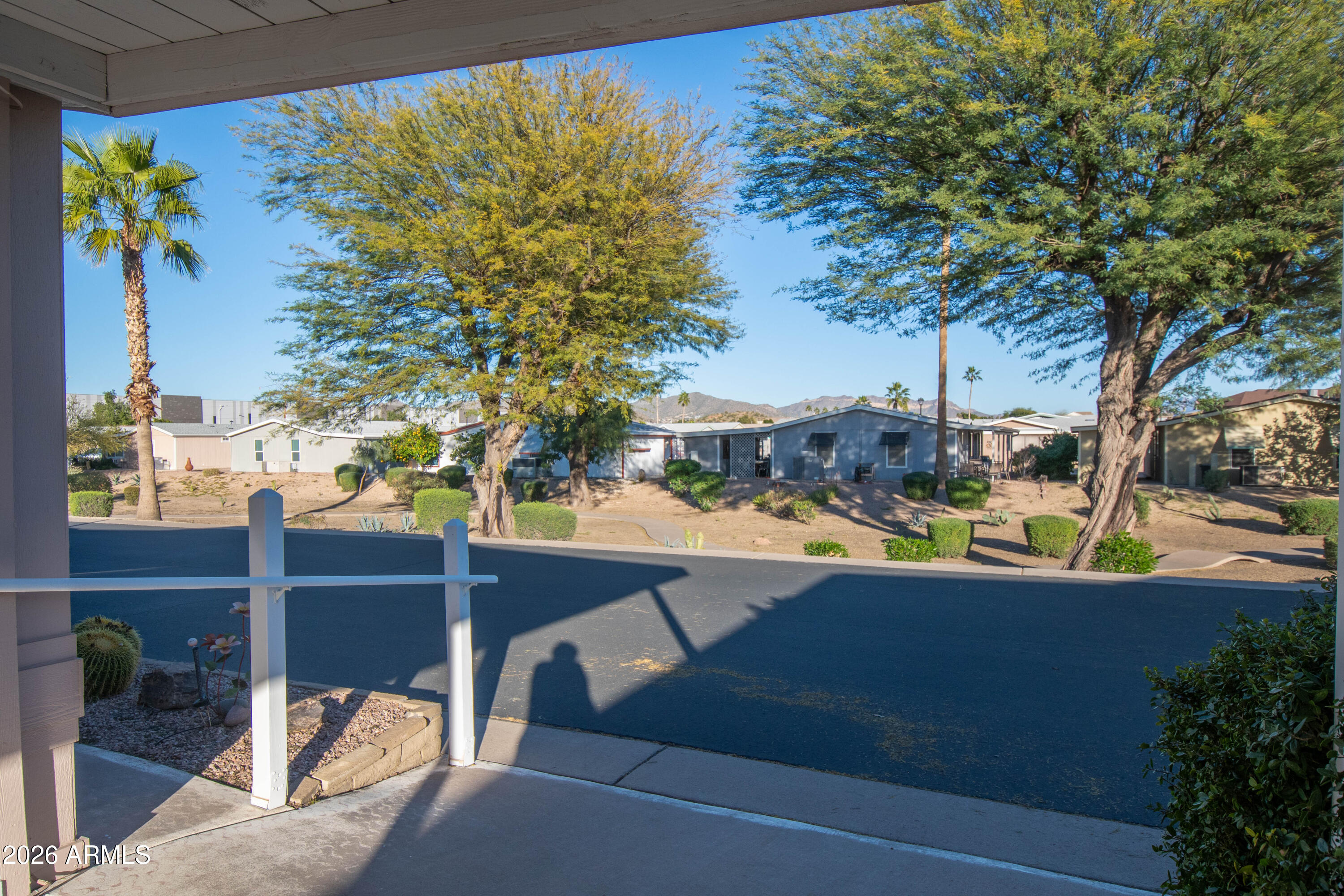 5735 East McDowell Road, Unit 26 Mesa, AZ 85215 - Photo 23 of 39 a view of a balcony with plants