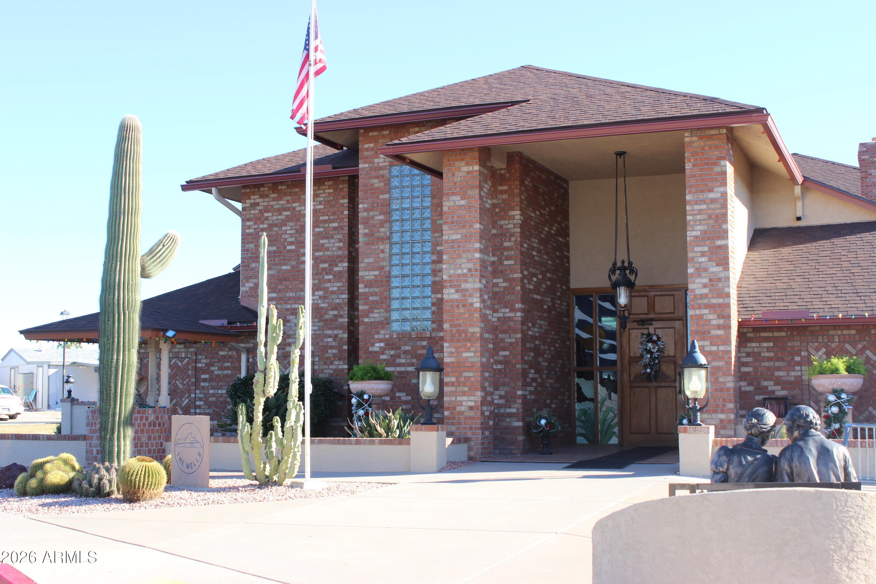 5735 East McDowell Road, Unit 26 Mesa, AZ 85215 - Photo 30 of 39 a view of a house with a small yard