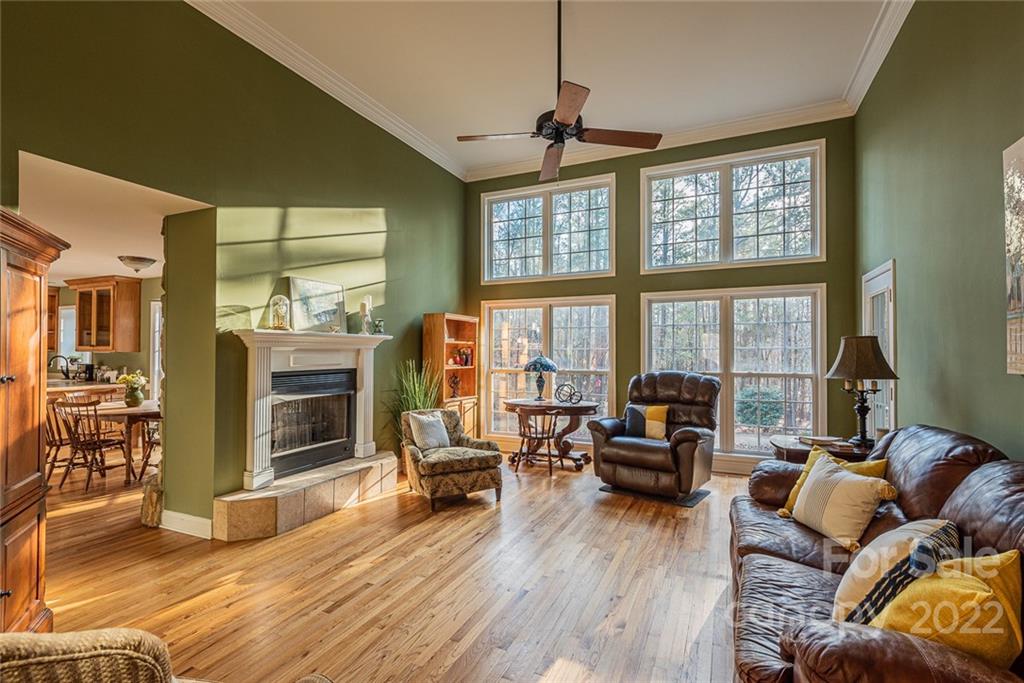 2389 Holbrook Road Fort Mill, SC 29715 - Photo 6 of 35 a living room with furniture large window and wooden floor