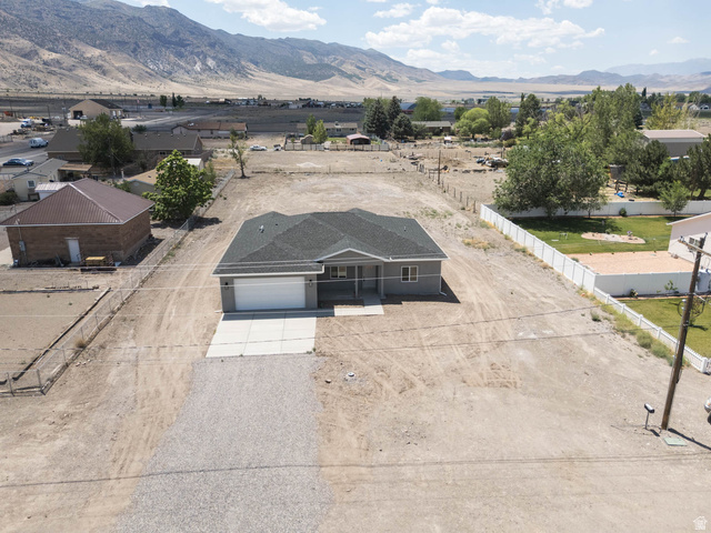 51 West 500 South Monroe, UT 84754 - Photo 31 of 41 Single-story residence featuring a gray exterior and a dark shingle roof