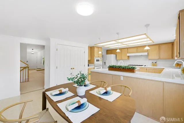 a room with furniture and a large window