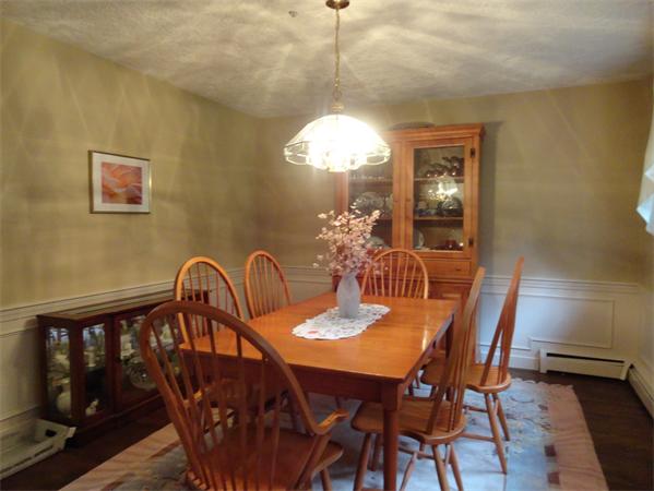 39 Barton Road Stow, MA 01775 - Photo 9 of 14 a dining room with furniture and window
