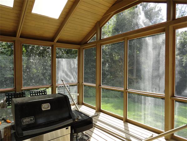 39 Barton Road Stow, MA 01775 - Photo 10 of 14 a view of a balcony with a floor to ceiling window