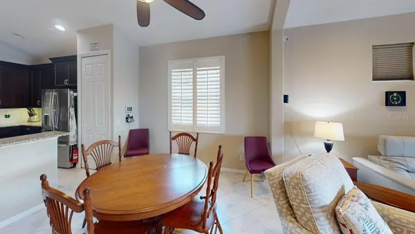 a bathroom with a sink vanity mirror and toilet