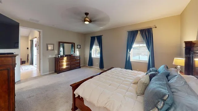 a view of storage and utility room with washer and dryer