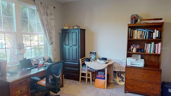 a kitchen with stainless steel appliances granite countertop a refrigerator sink and cabinets