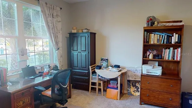 a kitchen with stainless steel appliances granite countertop a refrigerator sink and cabinets