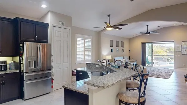 a room with furniture and flat screen tv