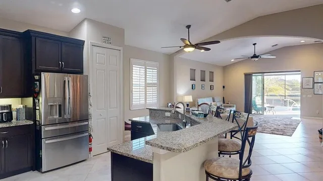 a room with furniture and flat screen tv