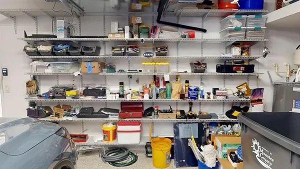 a view of swimming pool with a yard and sitting area