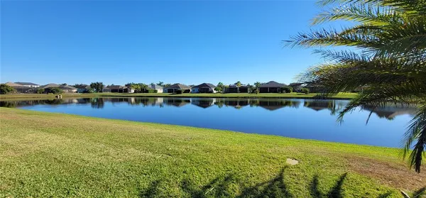 a view of an empty room with workspace and toys