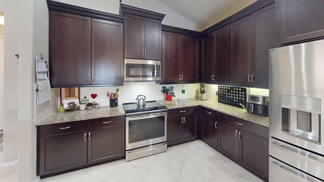 a bedroom with a bed and furniture