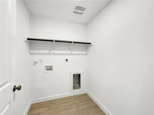 a view of small space with racks on the wall