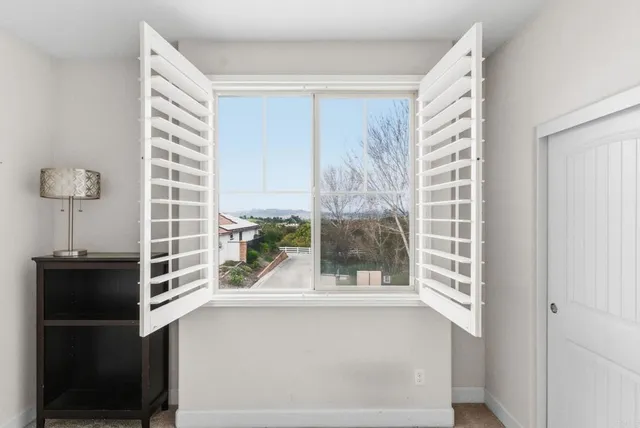 a view of a living room and a windows