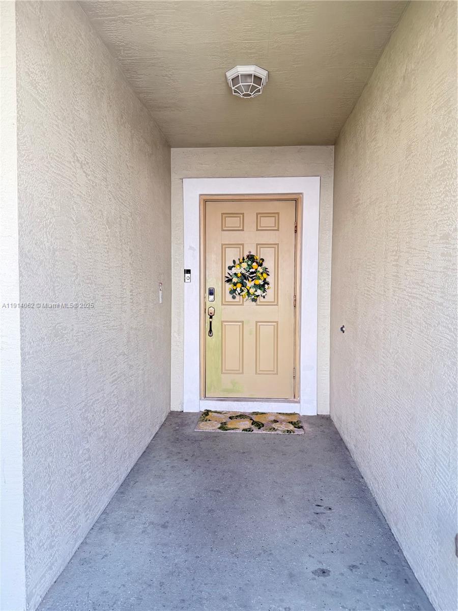 1018 Foster Road Hallandale Beach, FL 33009 - Photo 13 of 13 an empty room with a window