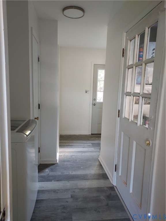 22417 Cox Road Sutherland, VA 23885 - Photo 12 of 22 a view of a hallway with wooden floor and staircase