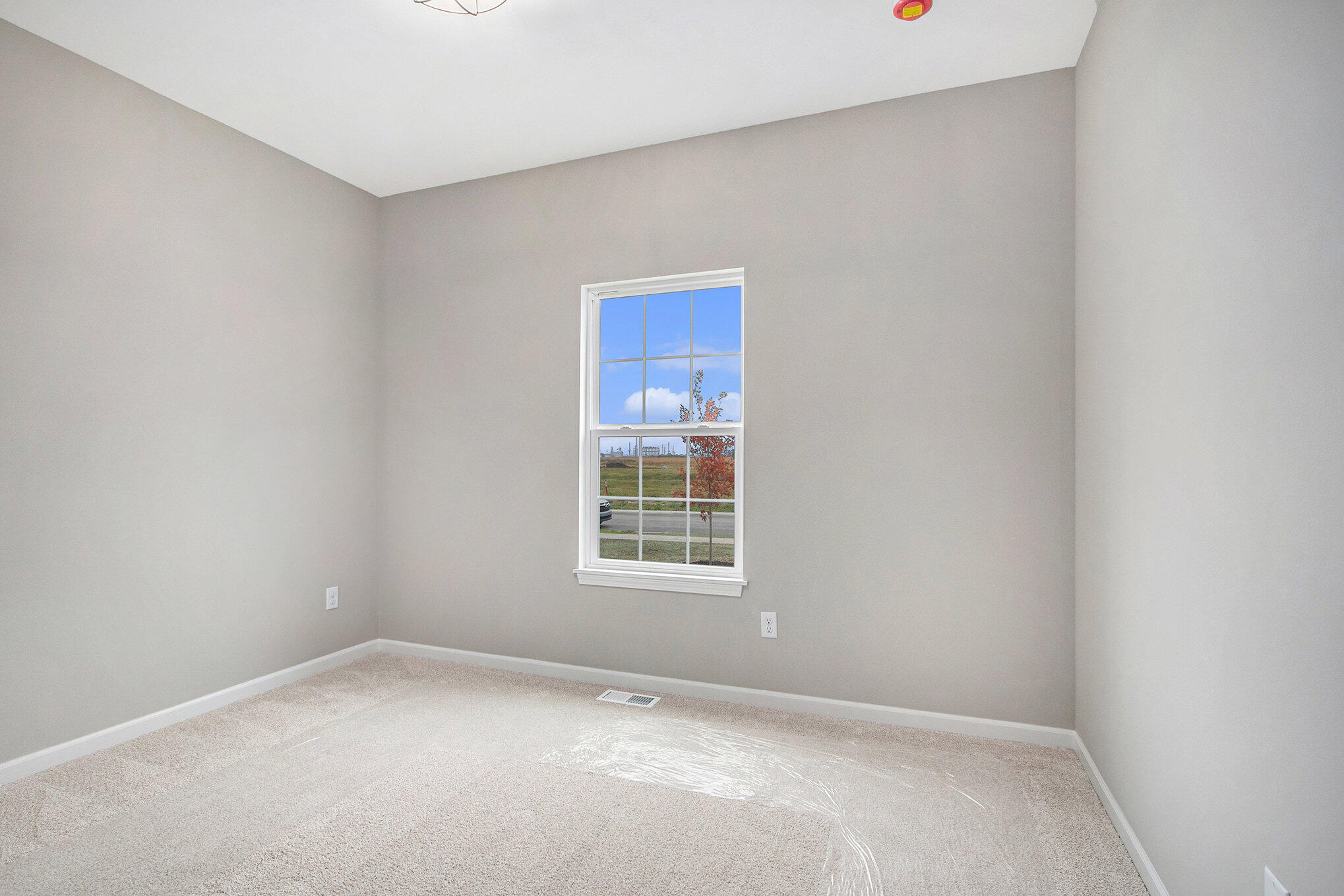 5766 Brookview Avenue Portage, IN 46368 - Photo 13 of 18 a view of an empty room with a window