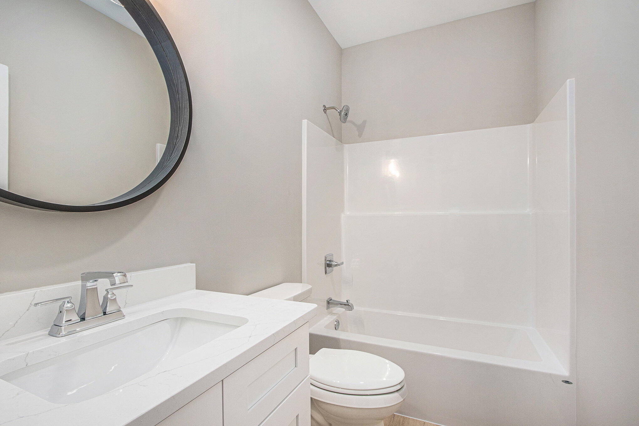 5766 Brookview Avenue Portage, IN 46368 - Photo 14 of 18 a bathroom with a sink a toilet and a mirror