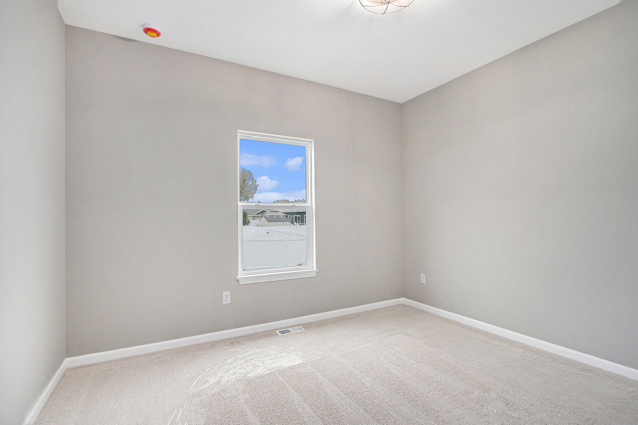 5766 Brookview Avenue Portage, IN 46368 - Photo 15 of 18 a view of an empty room with a window