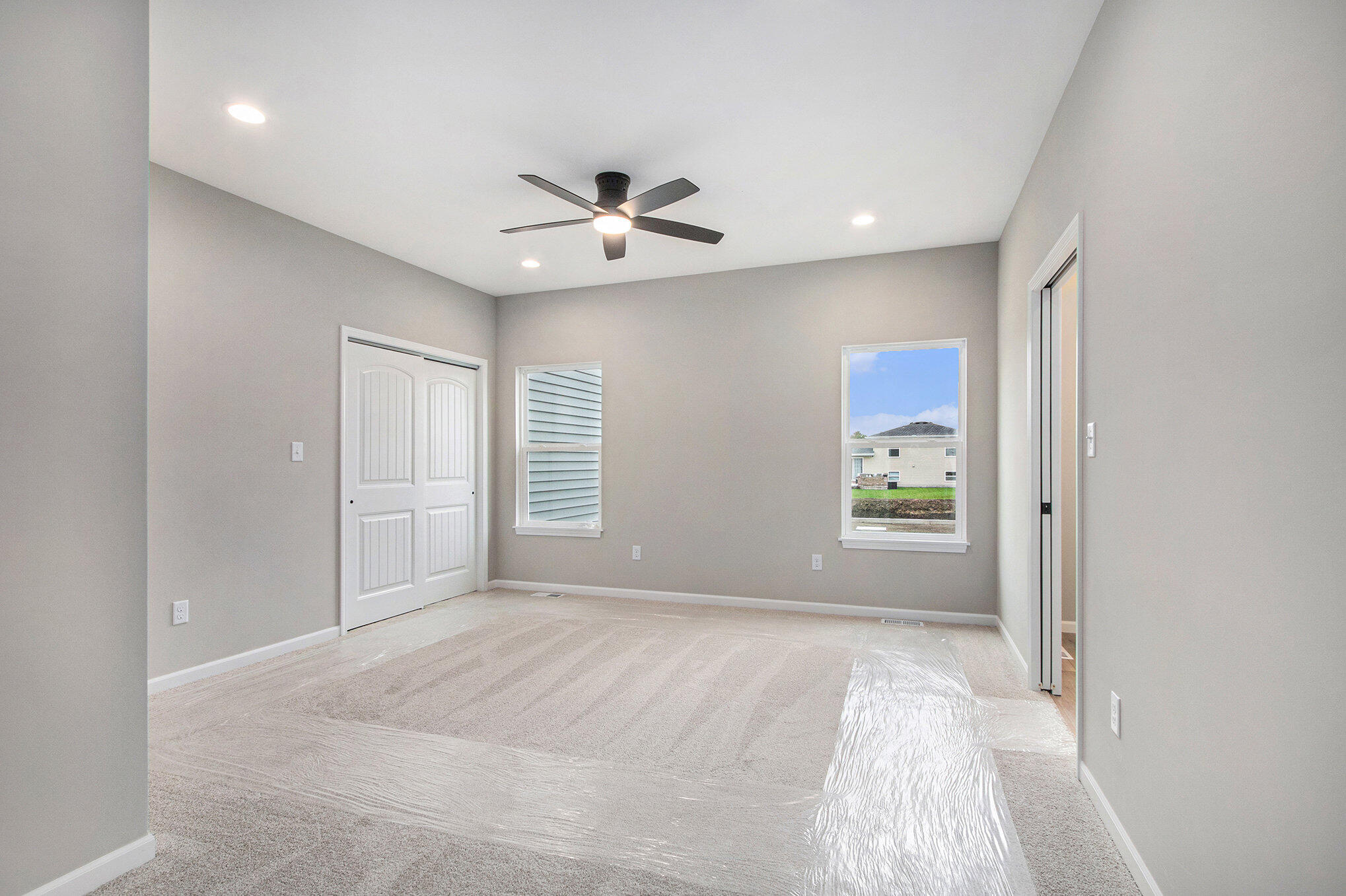 5766 Brookview Avenue Portage, IN 46368 - Photo 9 of 18 a view of livingroom with a ceiling fan and window