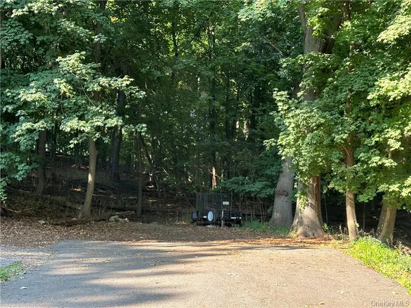 a view of street along with trees