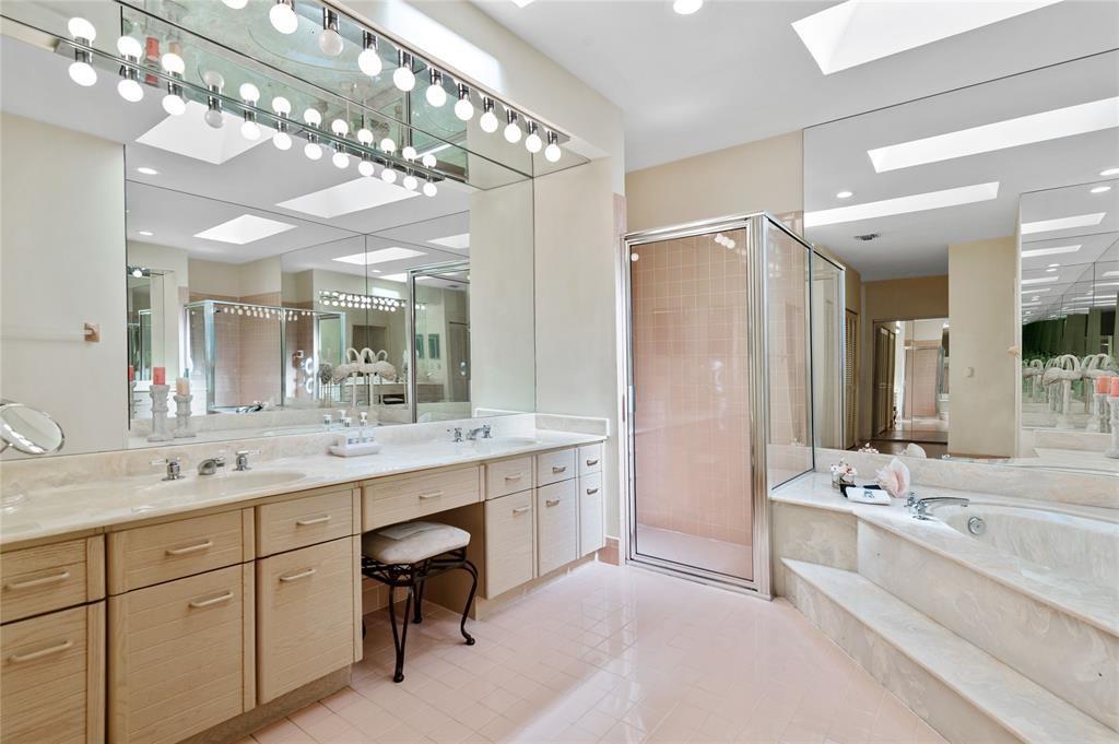8170 Hampton Wood Drive Boca Raton, FL 33433 - Photo 12 of 21 a large bathroom with a double vanity sink mirror and double