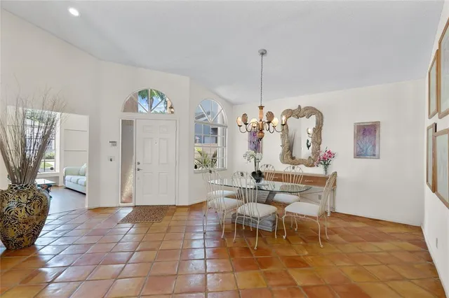 a view of a livingroom with furniture window and wooden floor