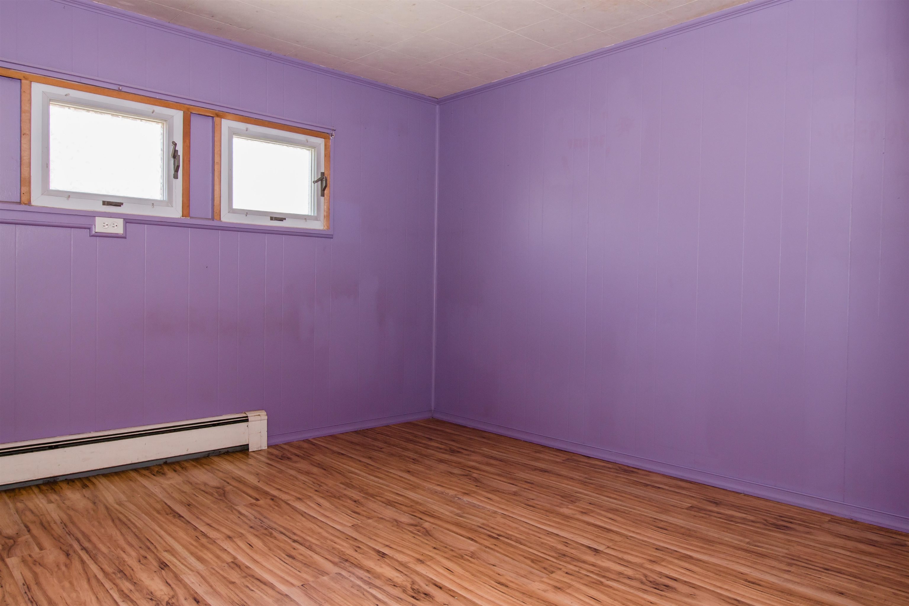 409 Bruce Street Bridgewater, VA 22812 - Photo 12 of 29 a view of empty room with wooden floor and fan
