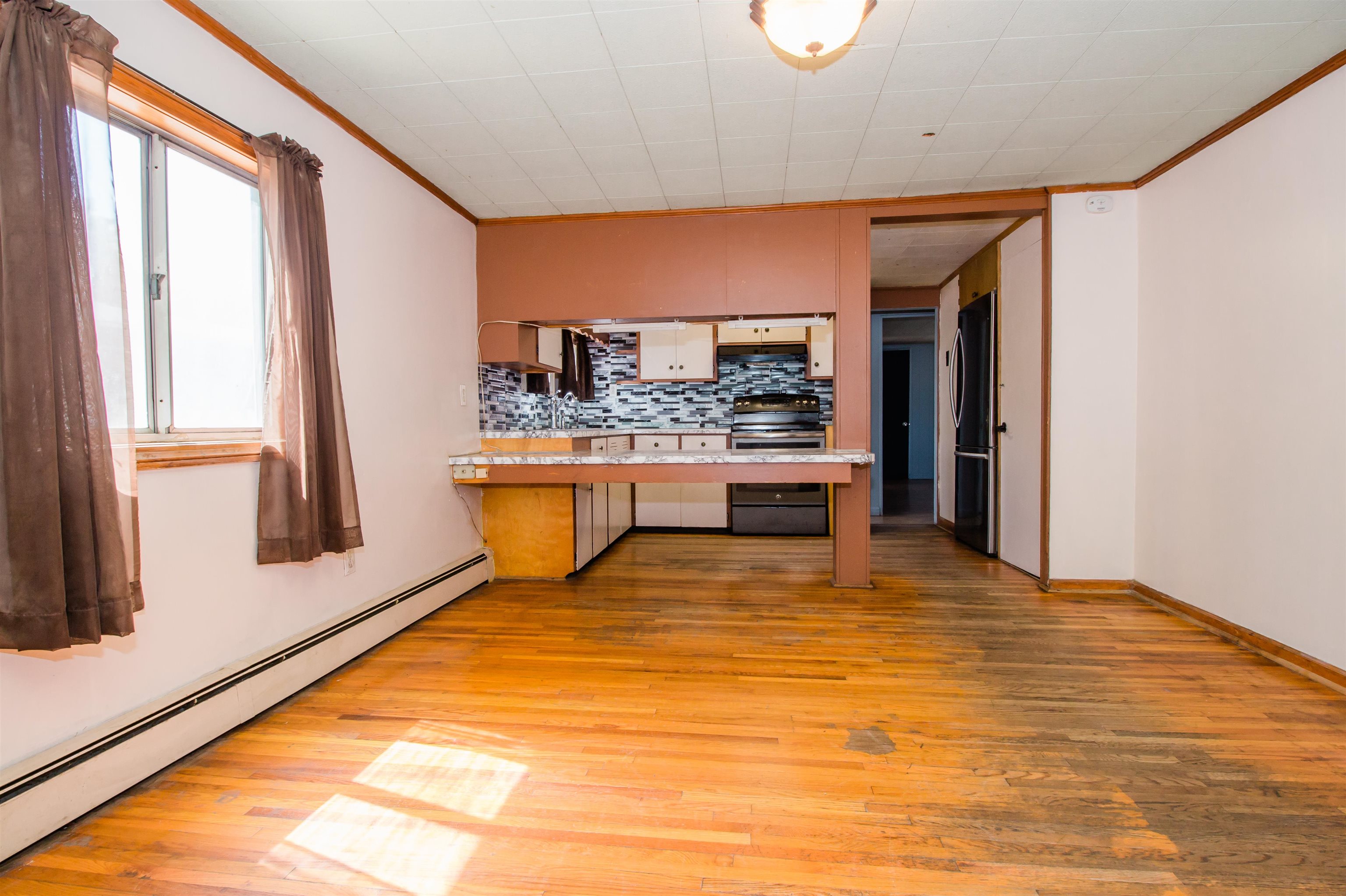 409 Bruce Street Bridgewater, VA 22812 - Photo 14 of 29 a view of a kitchen with a sink and cabinets
