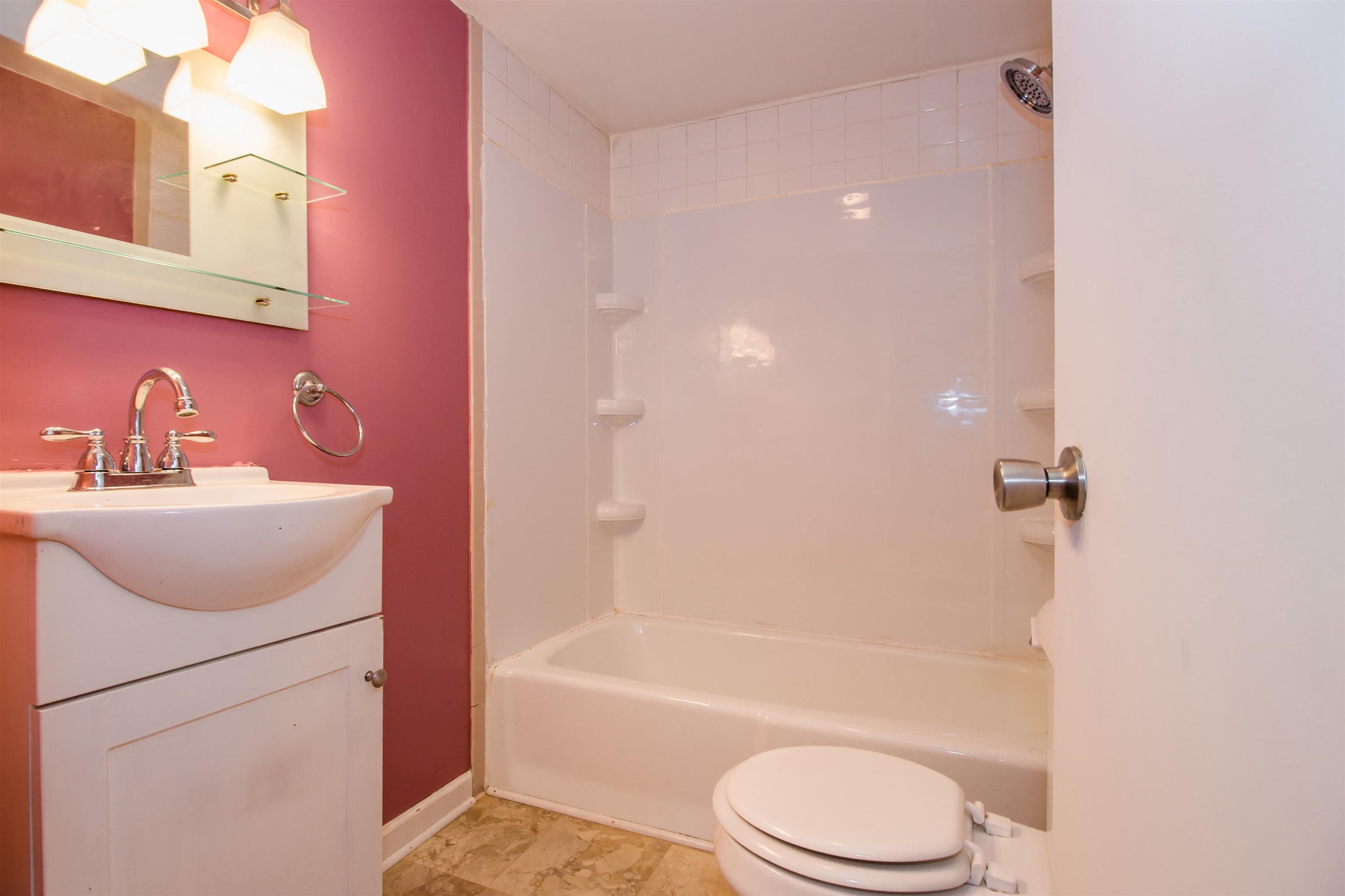 409 Bruce Street Bridgewater, VA 22812 - Photo 18 of 29 a bathroom with a sink toilet and shower