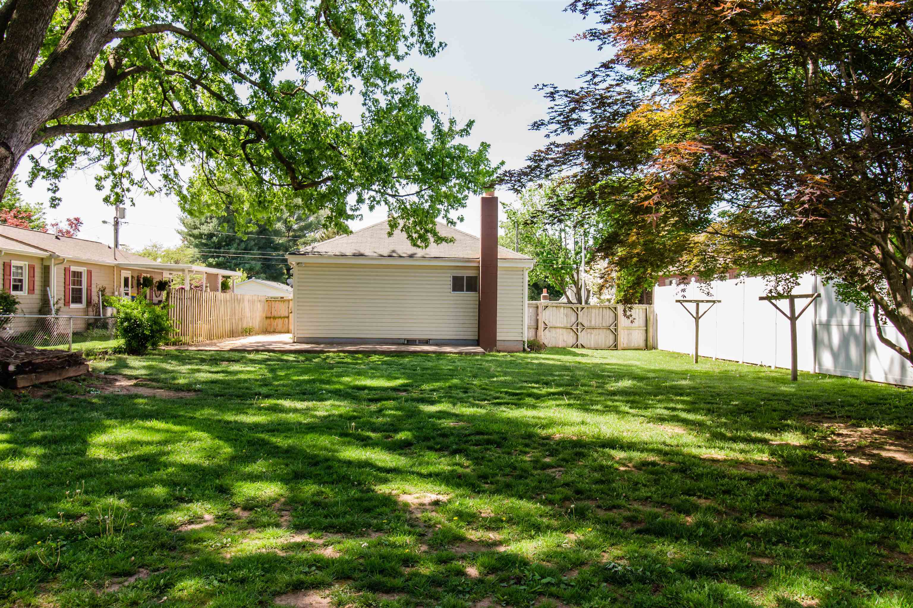 409 Bruce Street Bridgewater, VA 22812 - Photo 26 of 29 a view of a backyard with large trees
