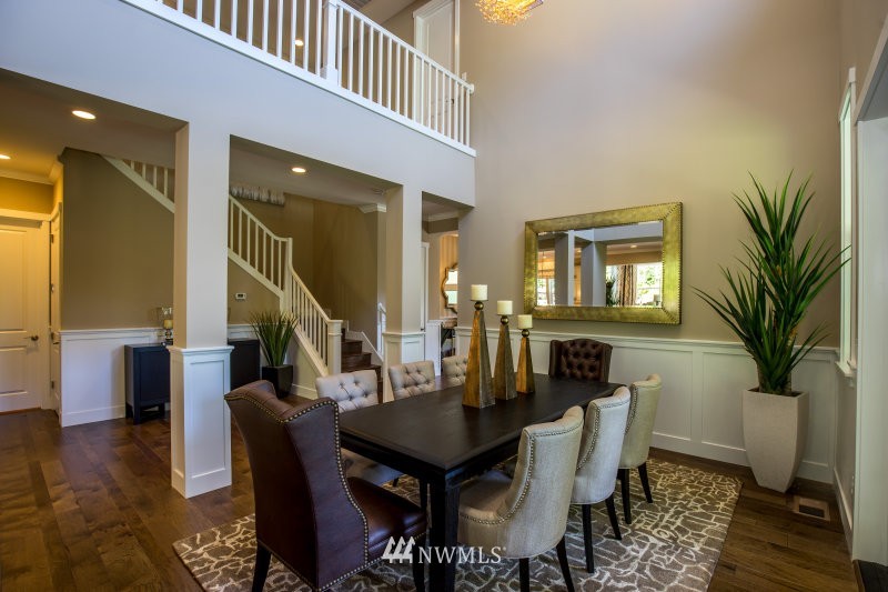 5629 196th Street Southeast, Unit 32 Bothell, WA 98012 - Photo 15 of 25 a dining room with furniture and wooden floor