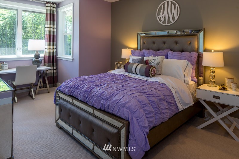 5629 196th Street Southeast, Unit 32 Bothell, WA 98012 - Photo 25 of 25 a bed sitting in a bedroom next to a window