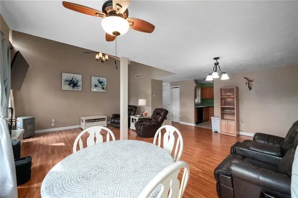 a view of a dining room with furniture