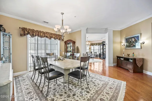 a view of a dining room with furniture