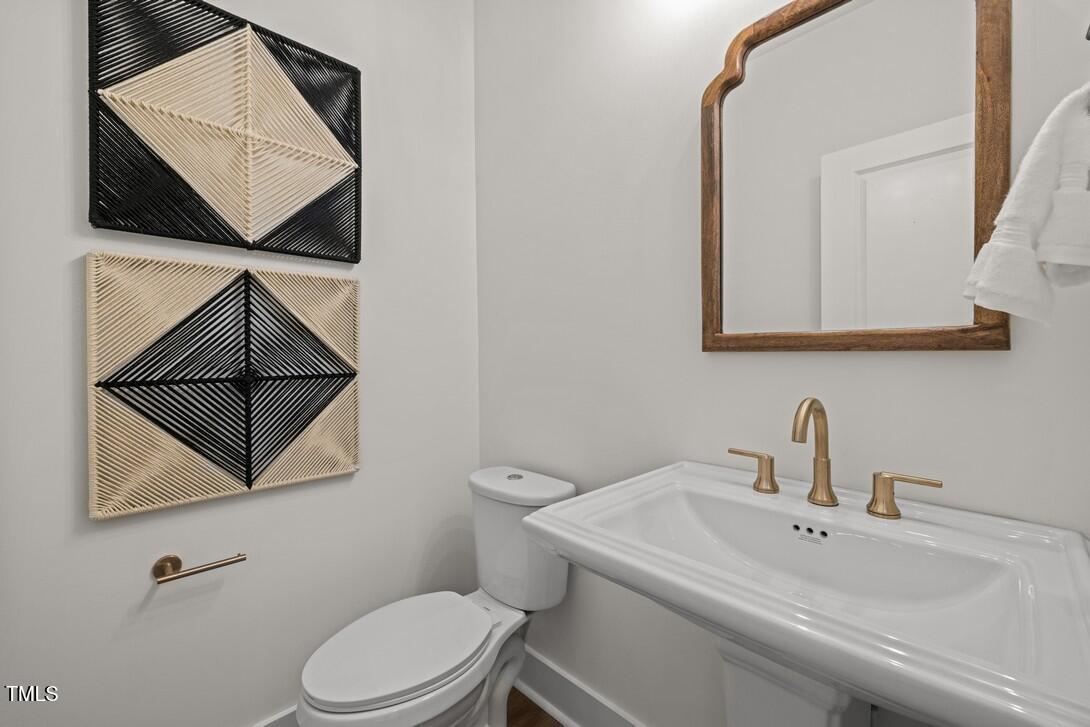 4734 Cypress Tree Lane Raleigh, NC 27612 - Photo 27 of 37 Elm Park 48_Powder Room_6.24.24_webready