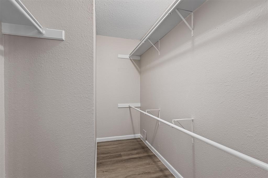 13357 Water Oak Lane, Unit B Austin, TX 78729 - Photo 16 of 26 a view of hallway with stairs