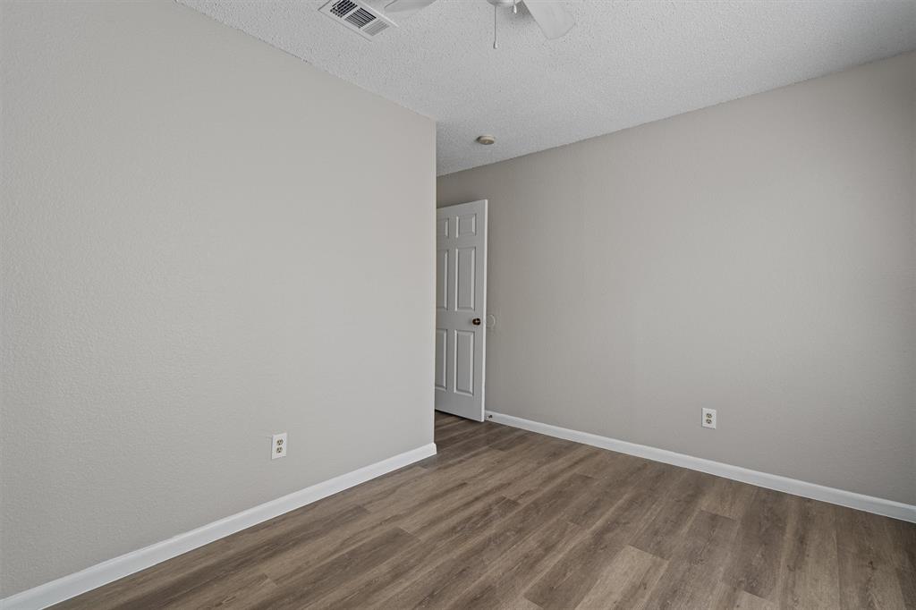 13357 Water Oak Lane, Unit B Austin, TX 78729 - Photo 18 of 26 a view of an empty room